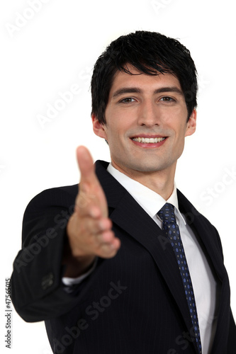 Photo: Man offering out hand Man offering out hand