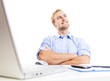 young man at office daydreaming