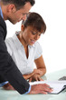 Business partners going over company accounts