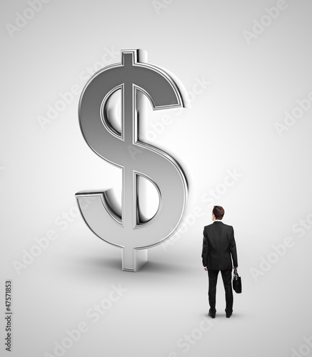 Photo: man and dollar man and dollar