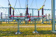 hight voltage tower in rural landscape with blue sky
