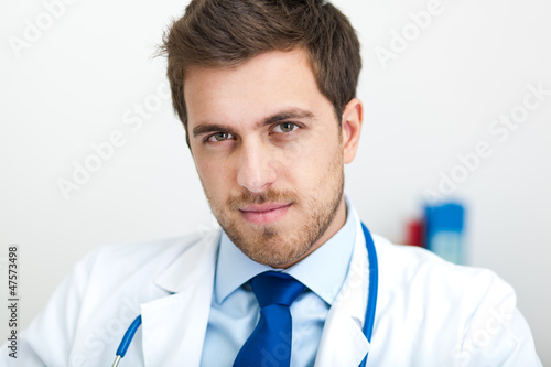 Photo: Doctor sitting in his studio Doctor sitting in his studio