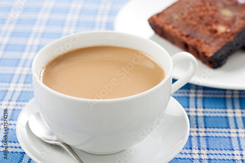Photo: Delicious breakfast with coffee and chocolate cake Delicious breakfast with coffee and chocolate cake