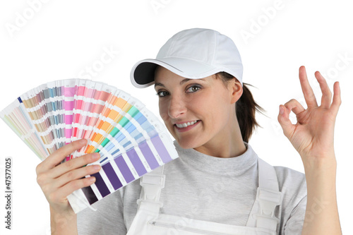 Photo: Decorator holding swatch Decorator holding swatch