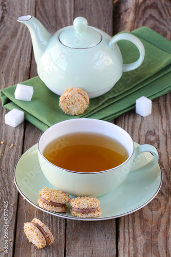 Photo: Cup of tea with chocolate cookies Cup of tea with chocolate cookies