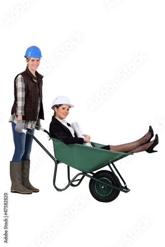 Photo: An architect getting a wheelbarrow ride. An architect getting a wheelbarrow ride.