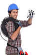 Electrician holding at symbol