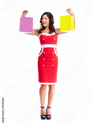 Photo: Beautiful woman with a shopping bags. Beautiful woman with a shopping bags.