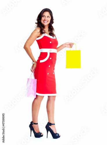 Photo: Beautiful woman with a shopping bags. Beautiful woman with a shopping bags.