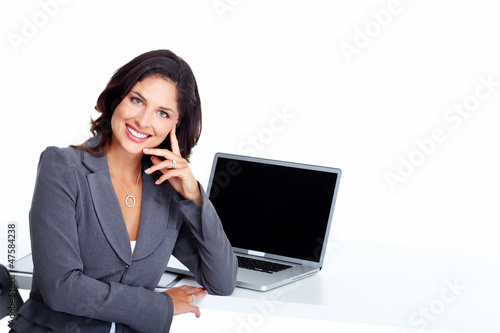 Photo: Business woman with laptop computer. Business woman with laptop computer.
