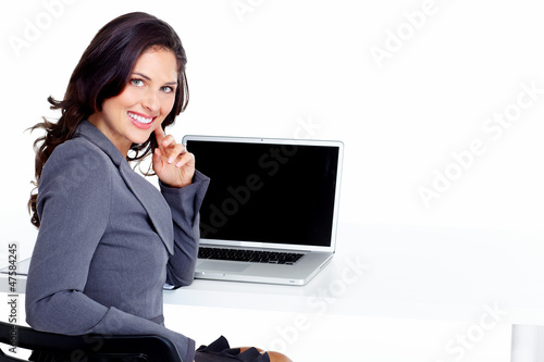 Photo: Business woman with laptop computer. Business woman with laptop computer.