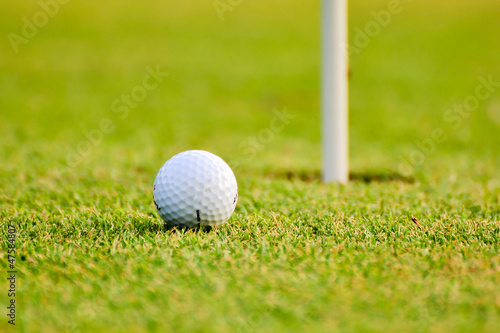 Photo: golf-ball on course golf-ball on course