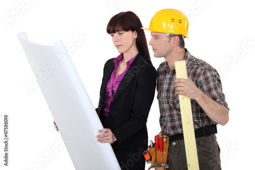Photo: Architect and a carpenter Architect and a carpenter