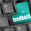 Feedback computer key showing opinion and surveys