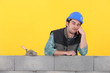 Mason asleep on top of wall