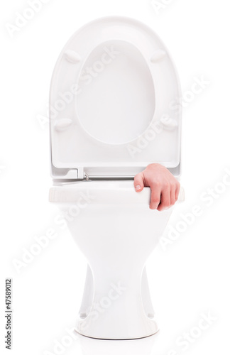 Photo: Toilet bowl with hand Toilet bowl with hand
