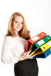 Business woman with folders on a light background