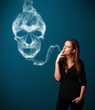 Young woman smoking dangerous cigarette with toxic skull smoke