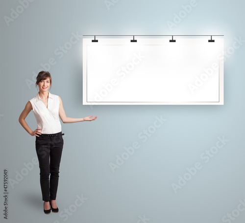 Photo: young woman presenting modern copy space young woman presenting modern copy space