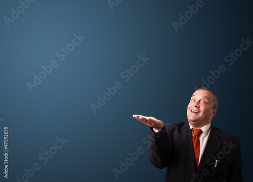 Photo: funny businessman gesturing with copy space funny businessman gesturing with copy space