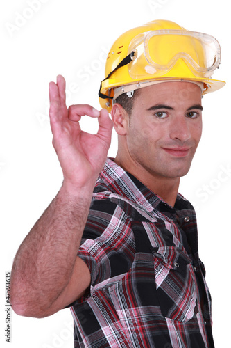 Photo: Construction worker giving the go-ahead Construction worker giving the go-ahead