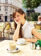 Relaxed Woman Enjoying in an Open Air Cafe