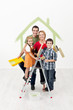 Family with kids painting their new home