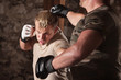 Photo: MMA Fighter Dodges a Punch MMA Fighter Dodges a Punch