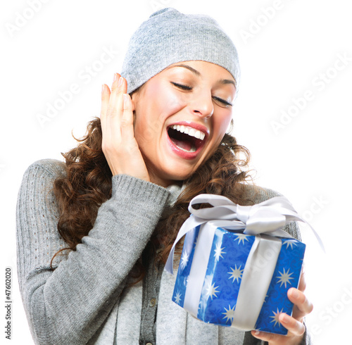 Photo: Happy Young Woman With Christmas Gift Box Happy Young Woman With Christmas Gift Box
