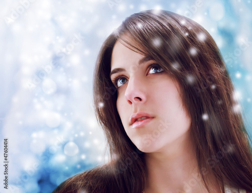 Photo: Young Woman Looking Upward Young Woman Looking Upward