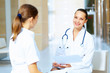 Photo: Portrait of two friendly female doctors Portrait of two friendly female doctors