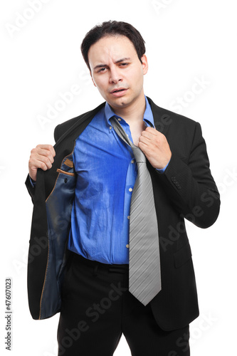 Photo: Sweating businessman due to hot climate Sweating businessman due to hot climate
