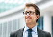 Smiling outdoor businessman
