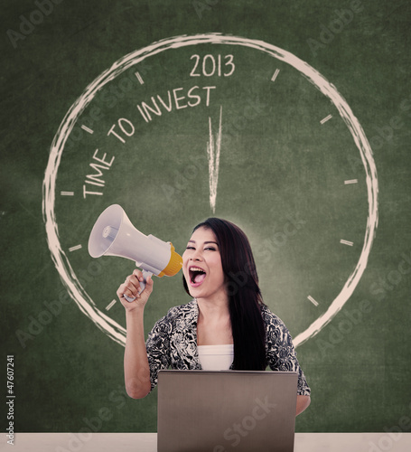 Photo: Announce invest time with speaker and laptop Announce invest time with speaker and laptop