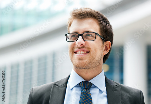 Photo: Smiling outdoor businessman Smiling outdoor businessman