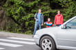 Familiy waiting by the Crosswalk