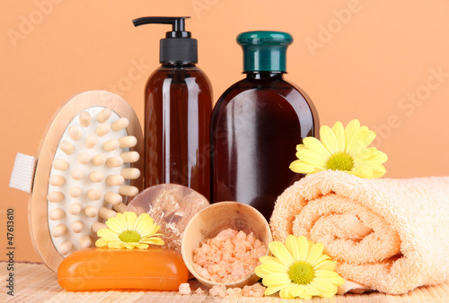 Photo: Set for care of a body on peach background Set for care of a body on peach background