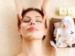 Spa Massage. Young Woman Getting Facial Massage