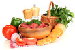 Raw beef meat in bowl with herbs and spices isolated on white