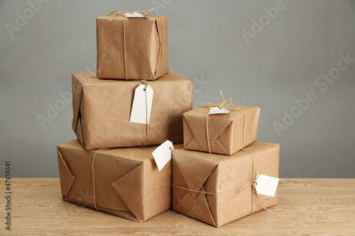 Photo: parcels boxes with kraft paper, parcels boxes with kraft paper,