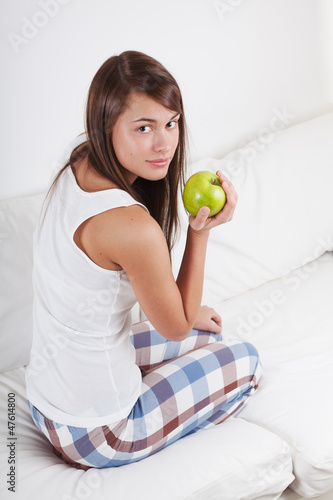 Photo: Beautiful woman with apple Beautiful woman with apple