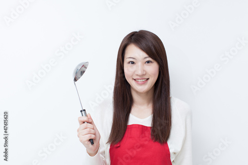 Photo: 料理する女性 料理する女性