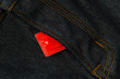 Photo: Condom in the pocket of a jeans Condom in the pocket of a jeans