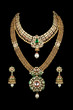 Close up of diamond necklace with diamond ear ring
