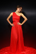 Foto: elegant young woman in red dress elegant young woman in red dress