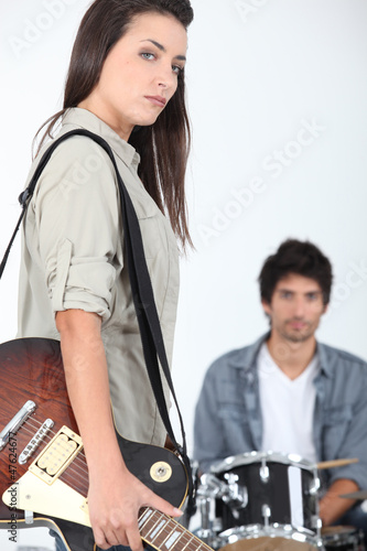 Photo: female singer with electric guitar female singer with electric guitar