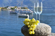 Two champagne glasses and grapes