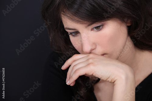 Photo: woman thinking woman thinking