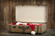 vintage suitcase with santa clothes