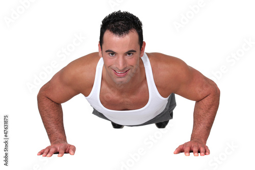Photo: Man doing push ups Man doing push ups